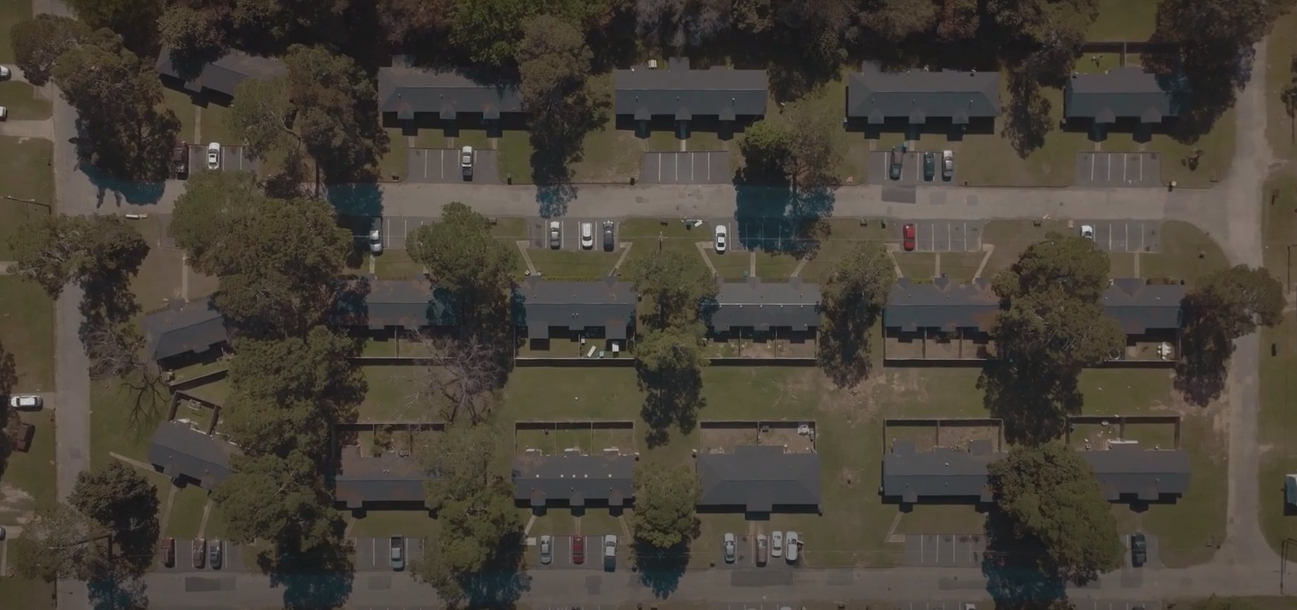 Dark aerial of The Mill Gardens Apartments