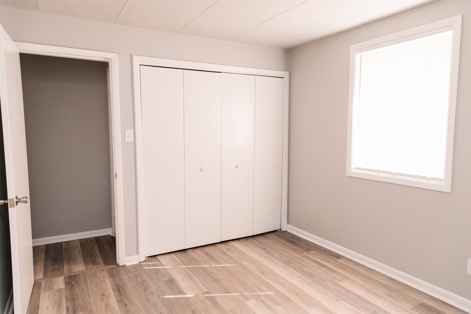 Apartment interior at The Mill Gardens — bedroom layout for families with elementary-age children in the David Perdue Elementary School zone
